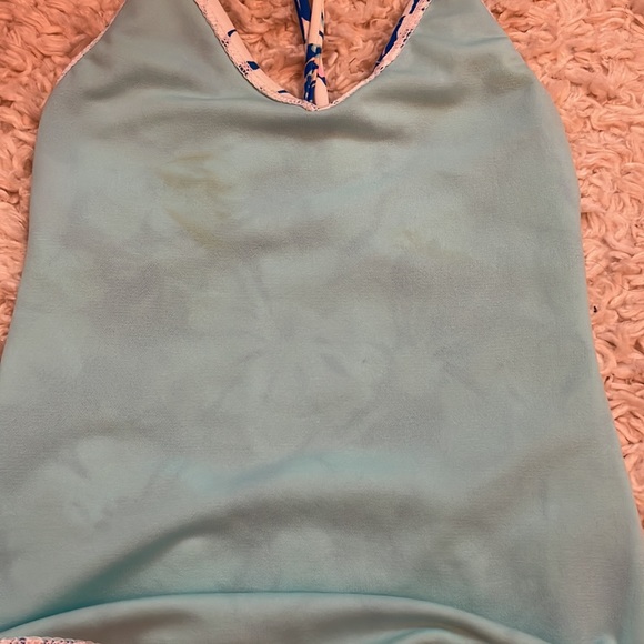 Girls swimsuit. In good condition. Has a yellow stain as seen on last pic. - Picture 4 of 4